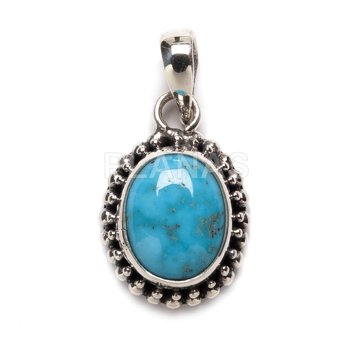 Pendant in sterling silver and real turquoise.