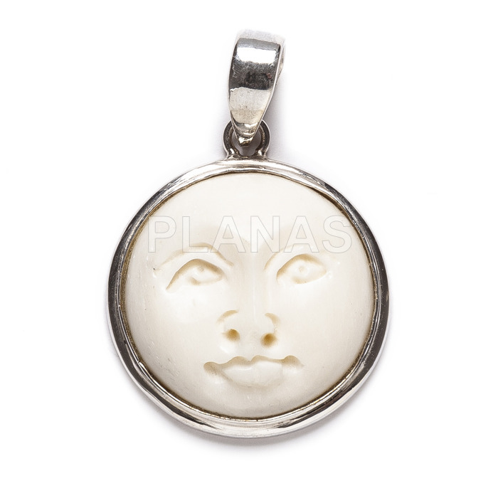 Pendant in sterling silver and bone. full moon face.