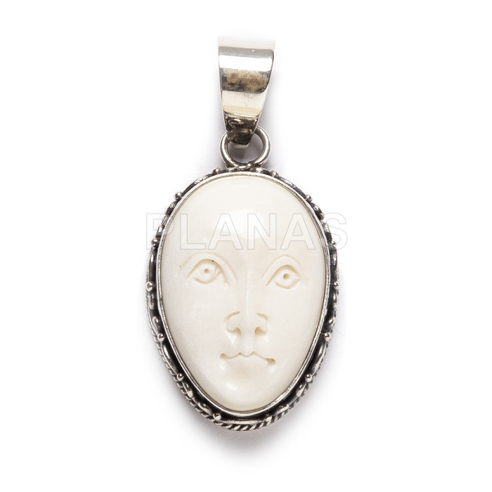 Pendant in sterling silver and bone. the face of the moon.