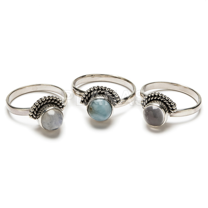 Adjustable ring in sterling silver and natural stones.