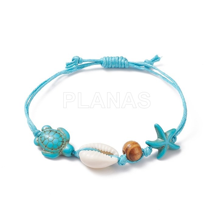 Synthetic turquoise and shell bracelet. turtle and sea star.