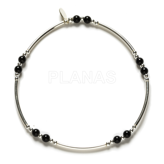 Elastic sterling silver and onyx bracelet.