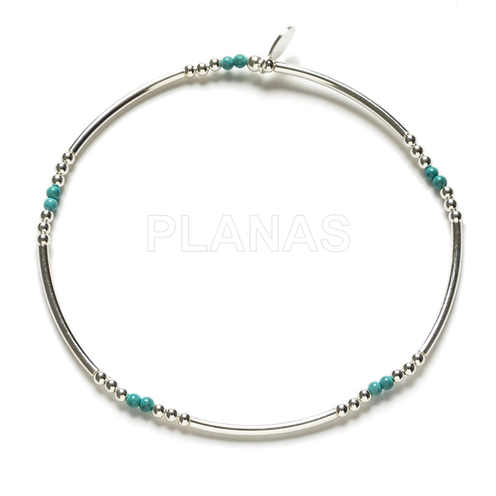 Elastic sterling silver and turquoise bracelet.