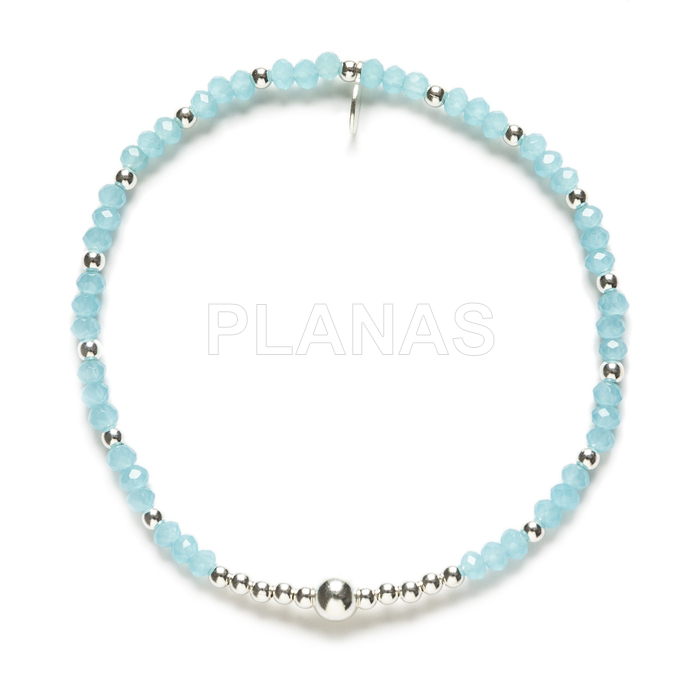 Elastic bracelet in sterling silver and crystal, aquamarine color.