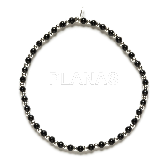 Elastic bracelet in sterling silver and onyx.