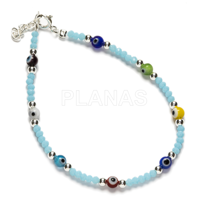 Bracelet en argent massif et perles de rocaille bleues. Œil turc.