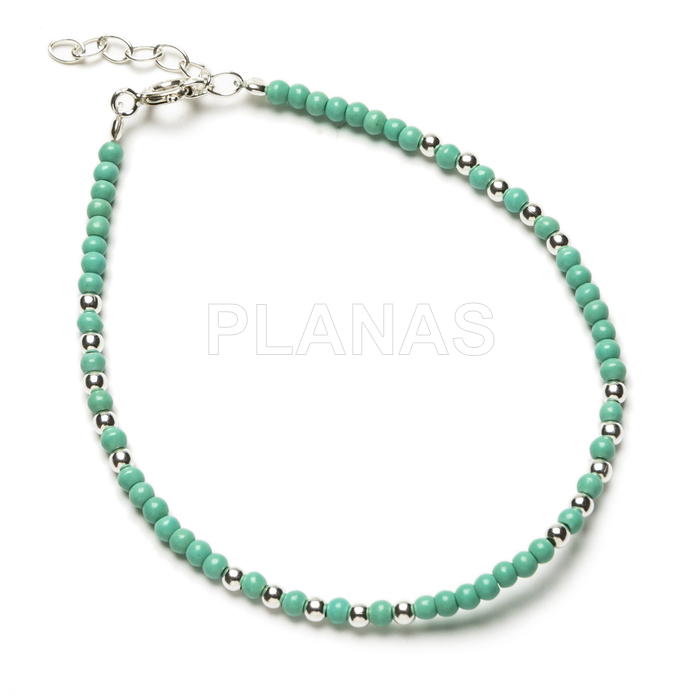 Bracelet in sterling silver and reconstituted turquoise.