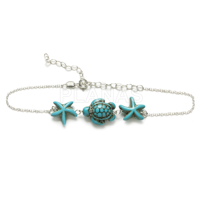Anklet in sterling silver with synthetic turquoise. turtle and sea star.