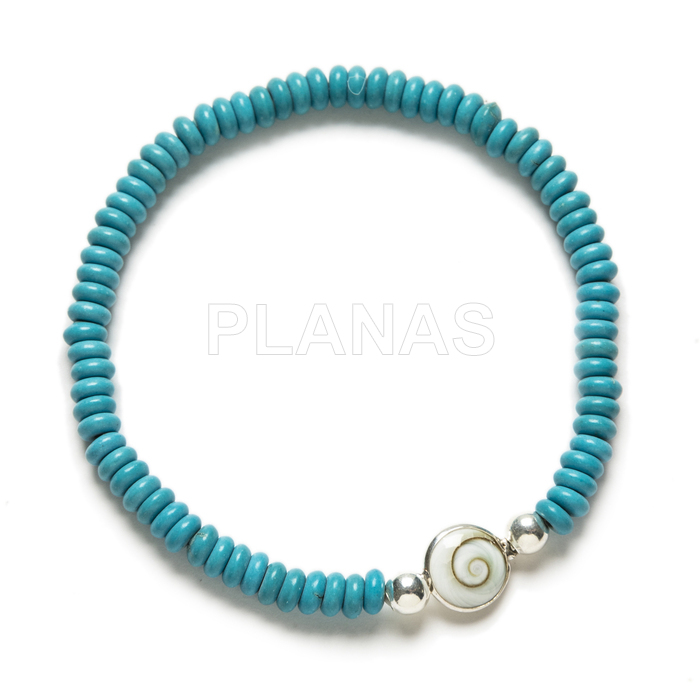 Elastic bracelet in sterling silver and turquoise reconstituted with a chiva piece.