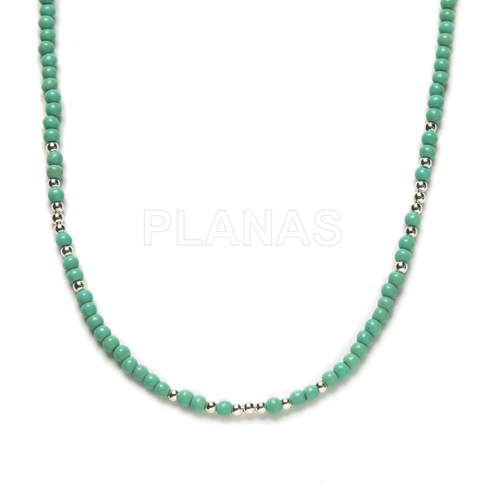 Necklace in sterling silver and turquoise balls.