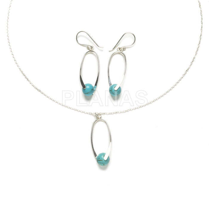 Earrings and pendant in sterling silver and reconstituted turquoise.