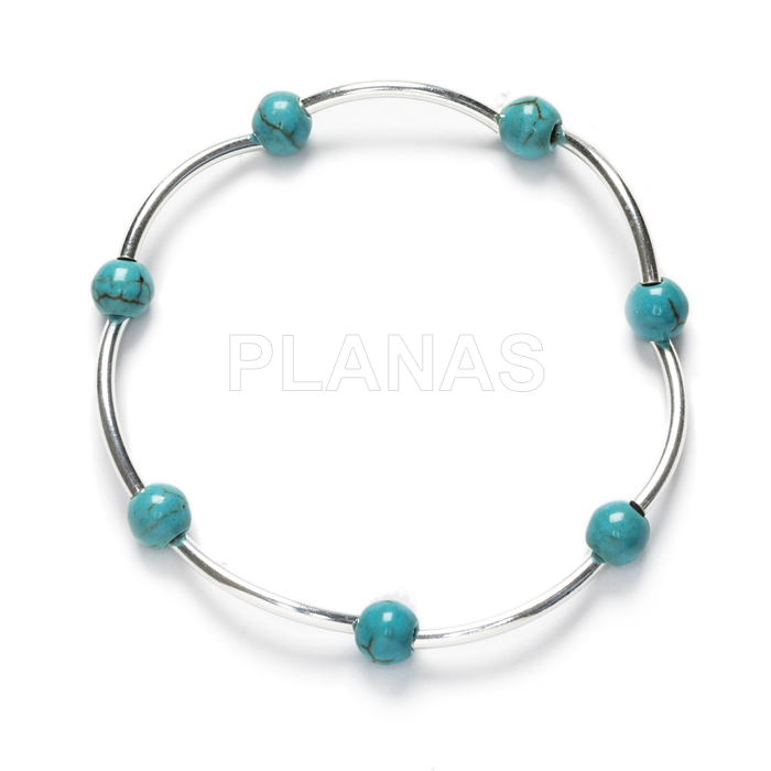 Elastic bracelet in sterling silver with 6mm turquoise balls.