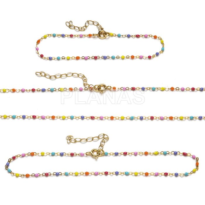 Necklace, bracelet and anklet in sterling silver and gold plated with enameled balls.