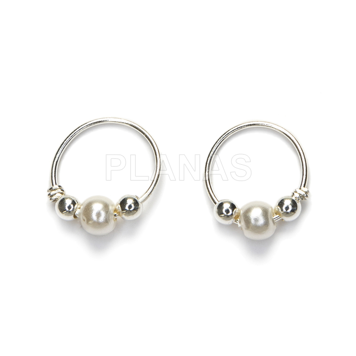 Hoops in sterling silver and pearl shell.
