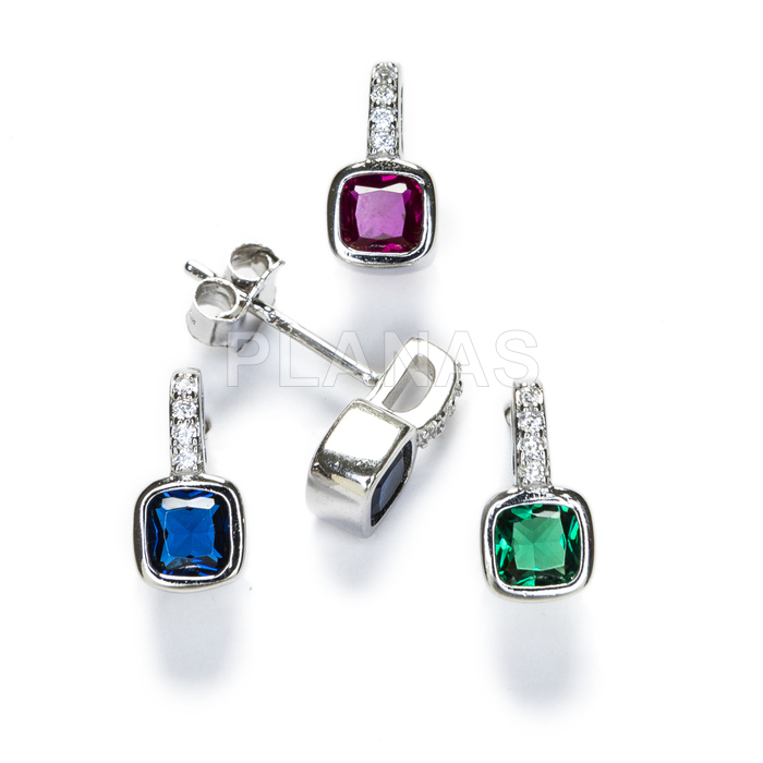 Earrings in rhodium-plated sterling silver and zircons.
