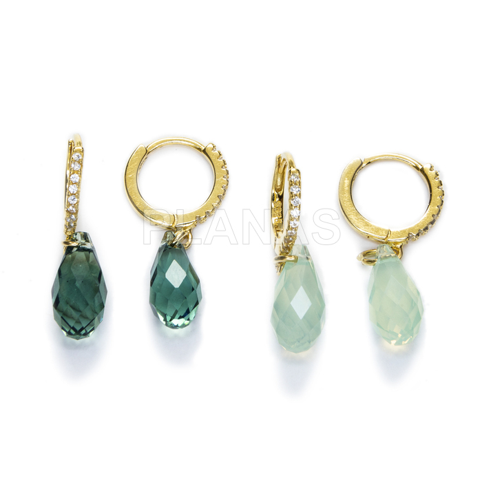 Hoops in sterling silver and gold plating with high quality crystal teardrops.