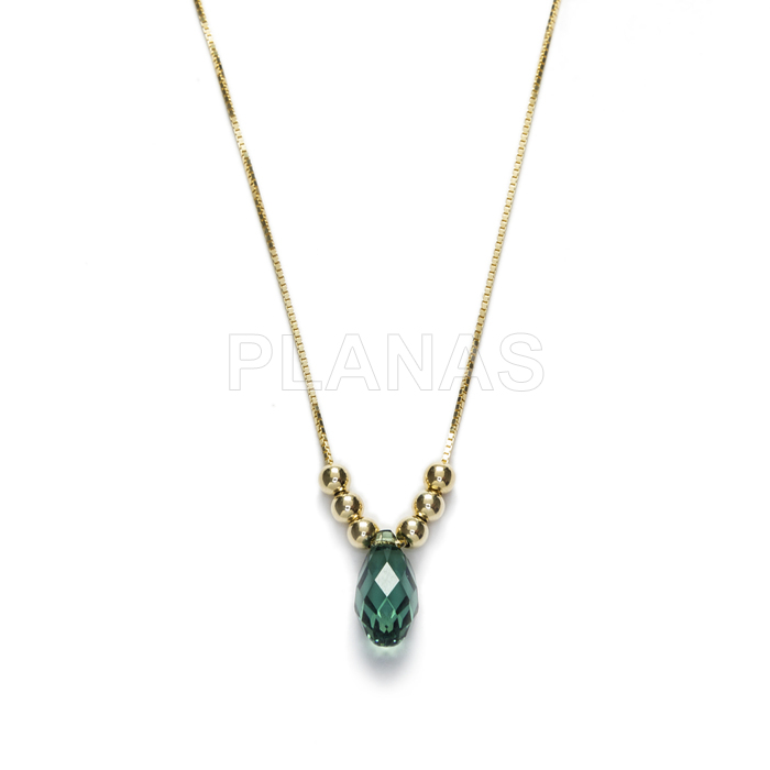 Necklace in sterling silver and gold plated with erenite colored teardrop.