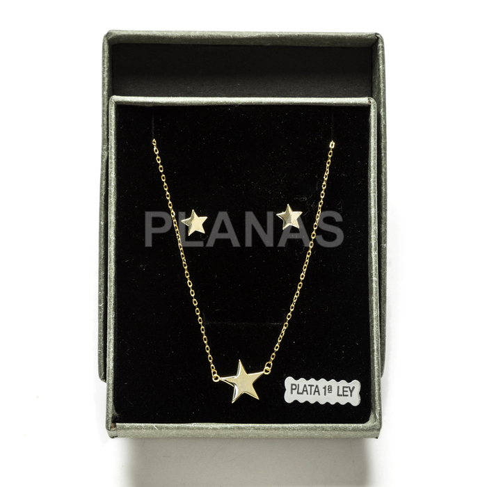 Set in sterling silver and gold plating. star.