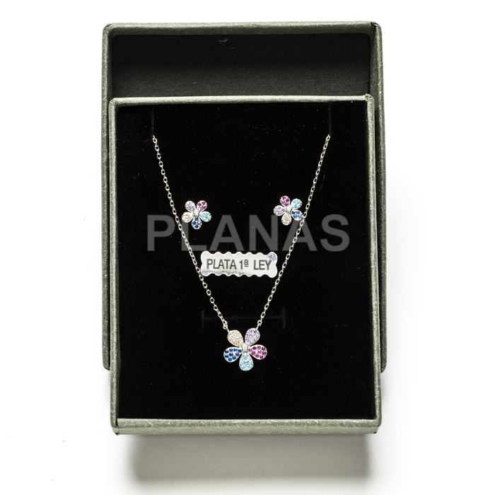 Set in rhodium-plated sterling silver and colored zirconia. flower.
