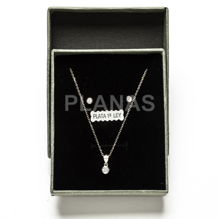 Set in rhodium-plated sterling silver and white zirconia.