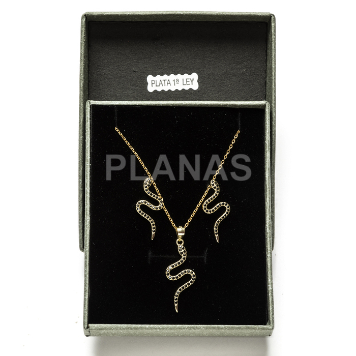 Set in sterling silver and gold plating with black zircons. snake.