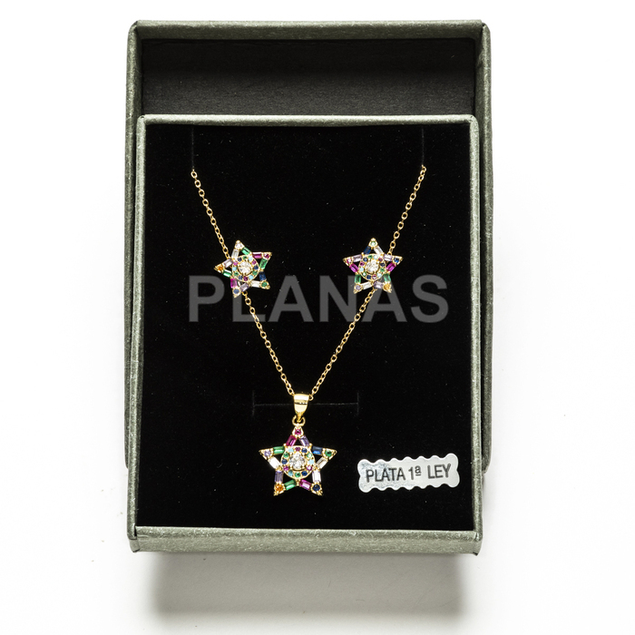 Set in sterling silver and gold plating with colored zircons. star.