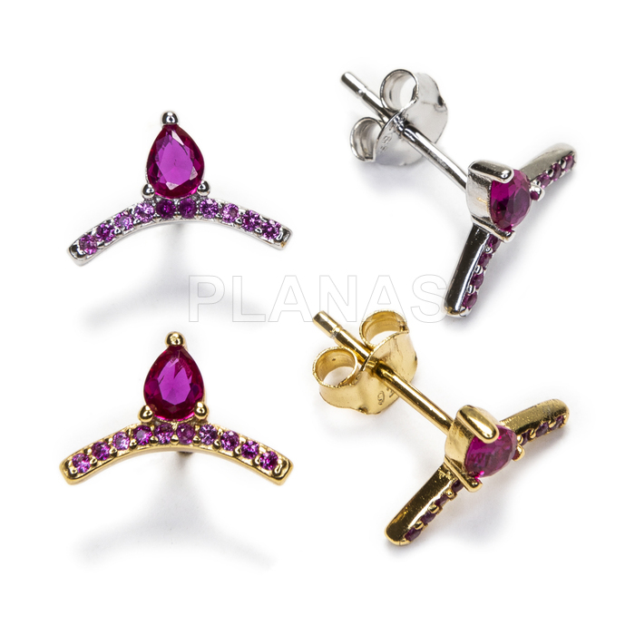 Earrings in rhodium-plated sterling silver and fuchsia zirconia.