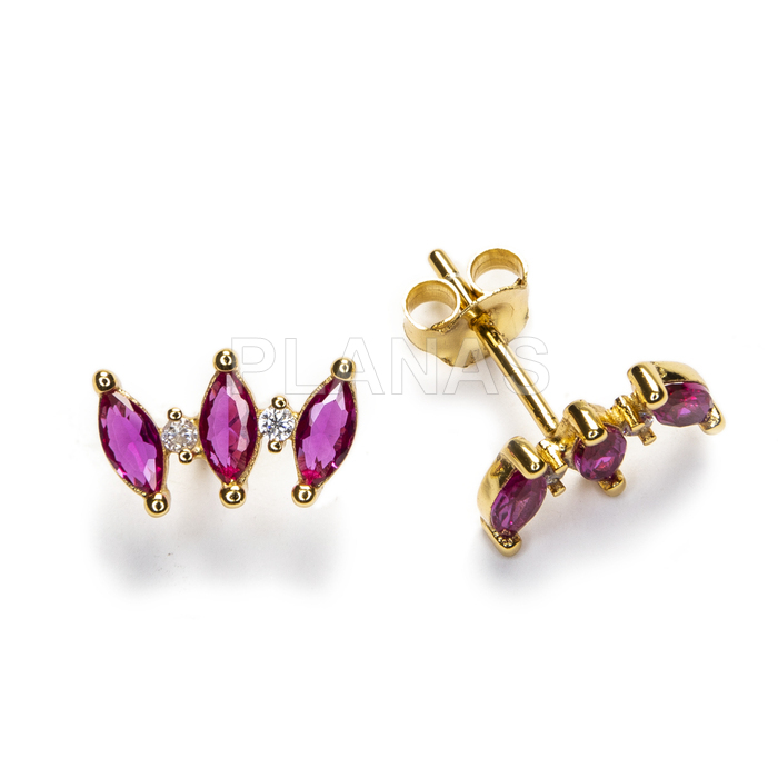 Earrings in sterling silver and gold plated with fuchsia zirconia.
