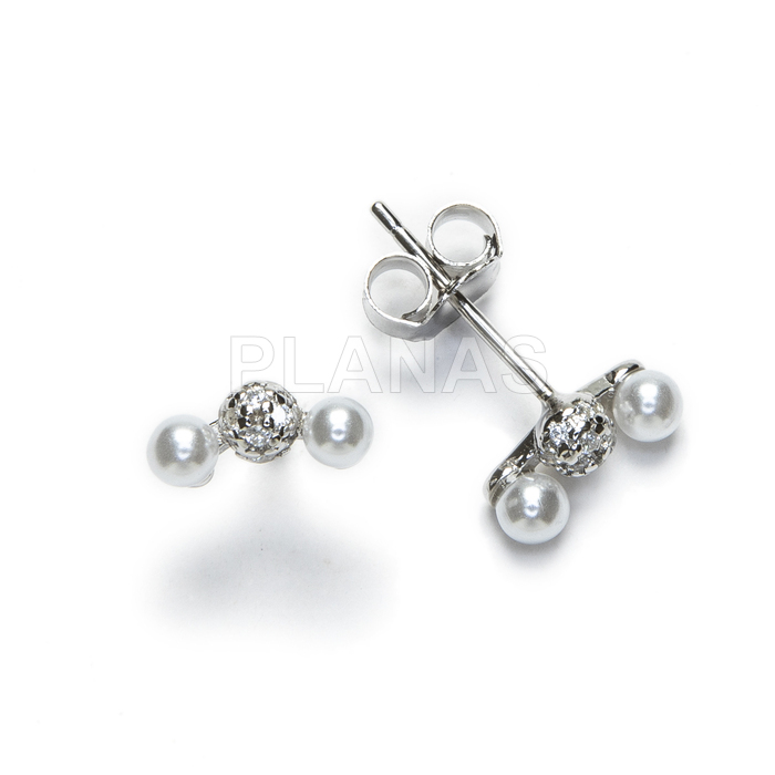 Earrings in rhodium-plated sterling silver with zircons and synthetic pearls.