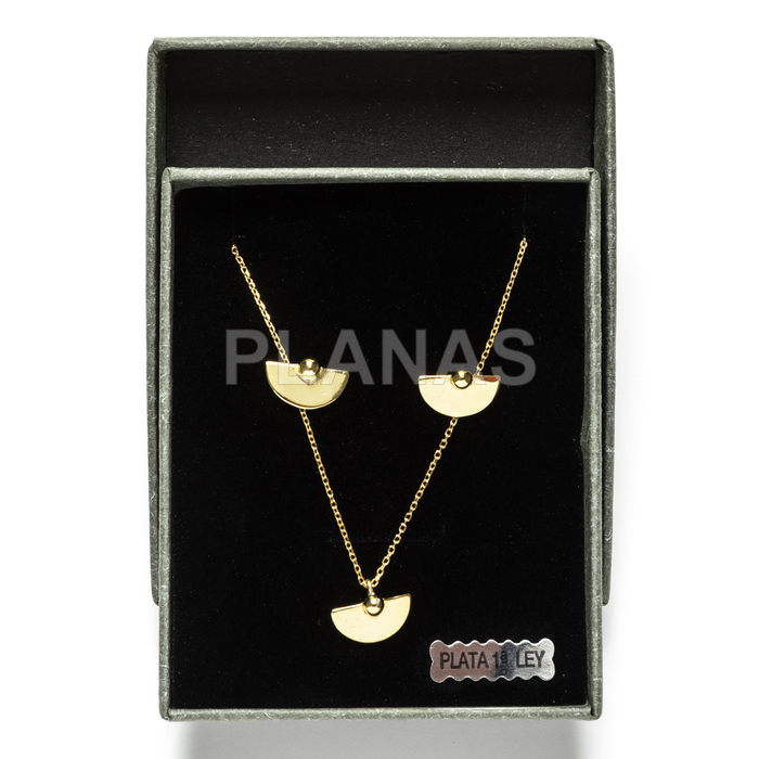 Set in sterling silver and gold plating.