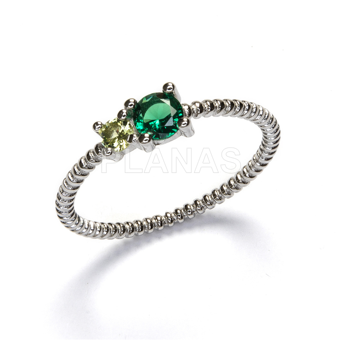 Ring in rhodium-plated sterling silver and green zirconia.  