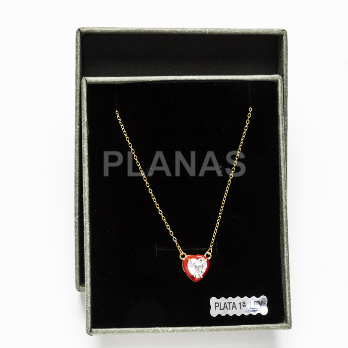 Pendant in sterling silver and gold plating with white zircons and enamel. red heart.  