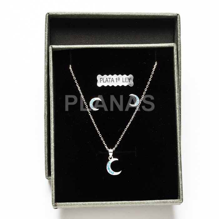 Set in rhodium-plated sterling silver and blue zirconia. moon.