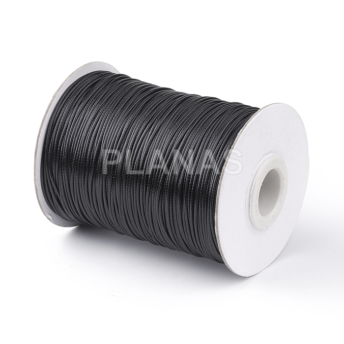 Spool of 77 meters of 1mm macrame waxed thread. black color.