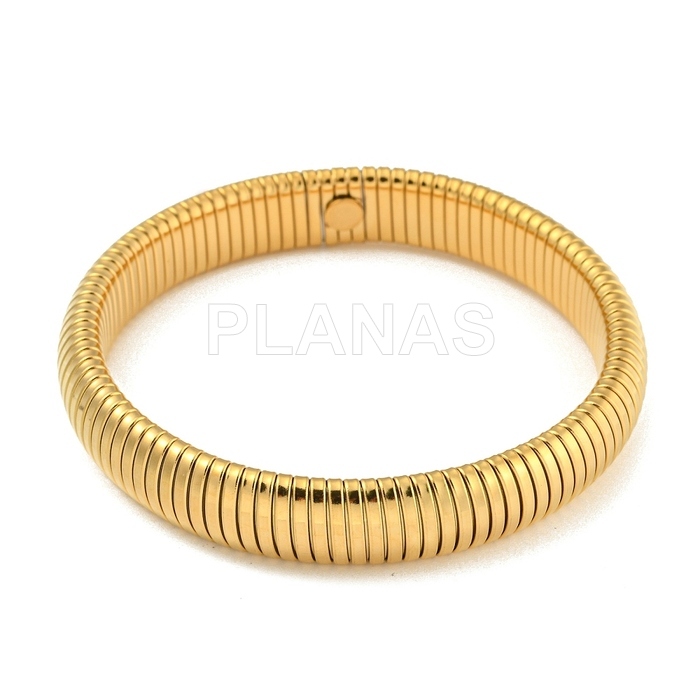 Pulseira rígida em aço inoxidável e banhada a ouro.