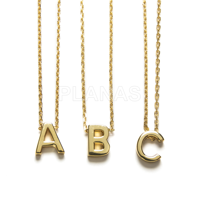 Letter necklace in sterling silver and gold plating.