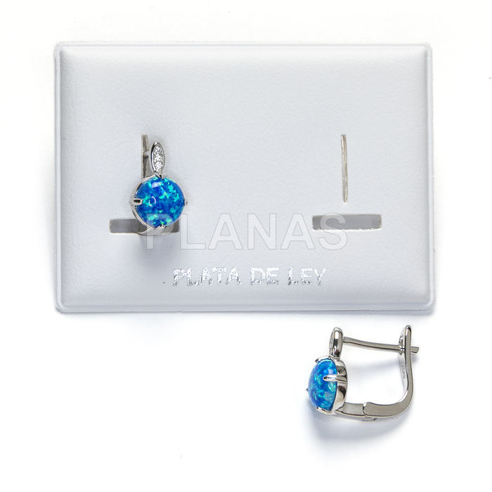 Earrings in rhodium-plated sterling silver with zircons and opal. 