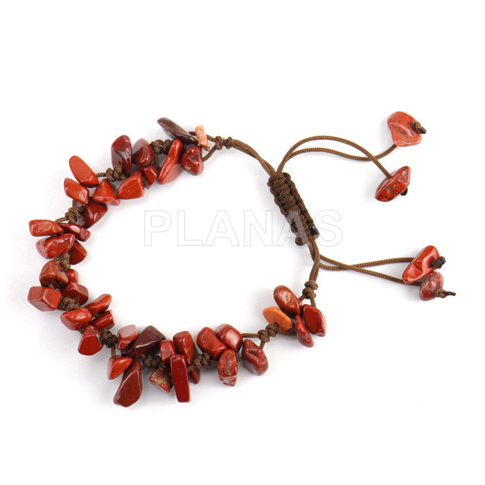 Bracelet with sliding knot and red jaster. 