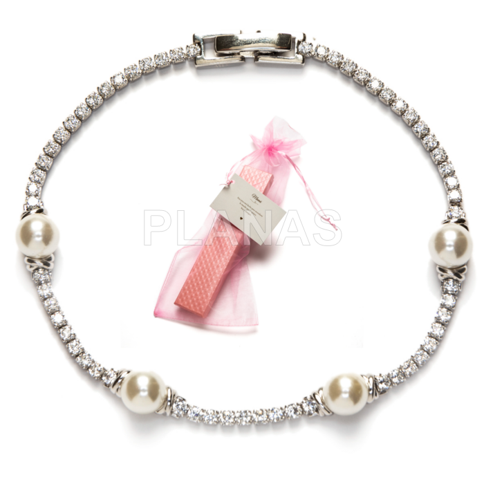 Pulseira riviere em prata de lei com banho de ródio, cravejada com zircônias cúbicas e pérolas de concha.  