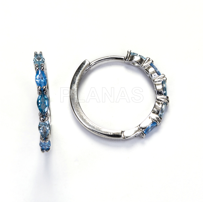 Aros en plata de ley rodiada y Circonitas Azules.   