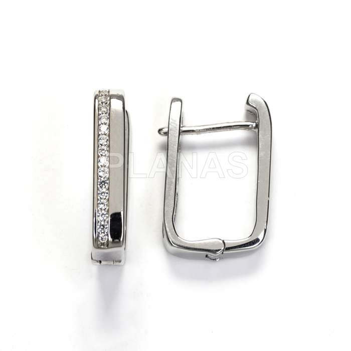 Aros en plata de ley rodiada con circonitas.