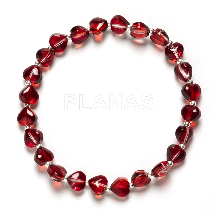 Pulsera elástica con corazones rojos con bolas en plata de ley.