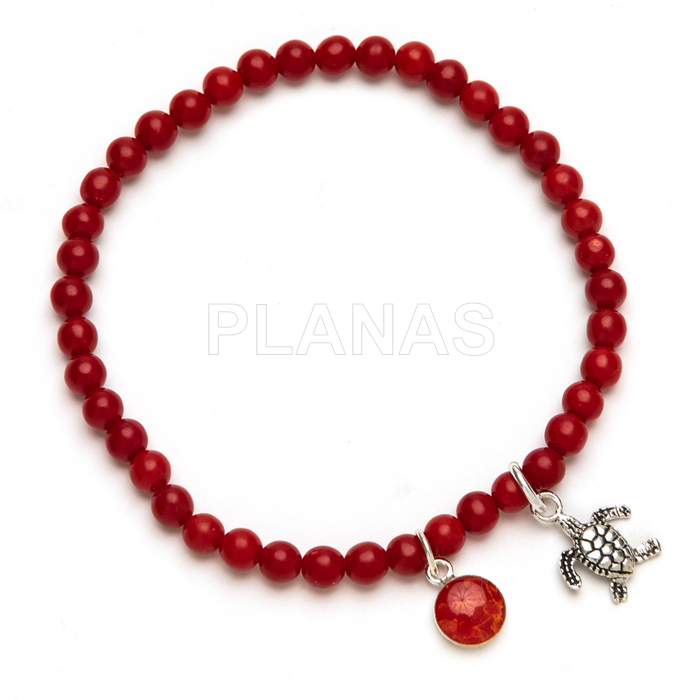 Pulseira elástica em prata de lei e coral. tartaruga.