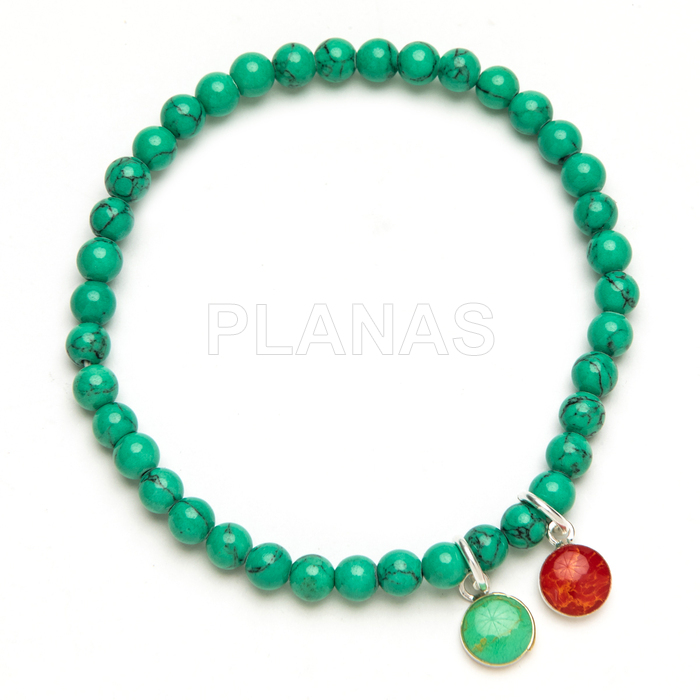Pulsera elástica en plata de ley y Turquesa. 