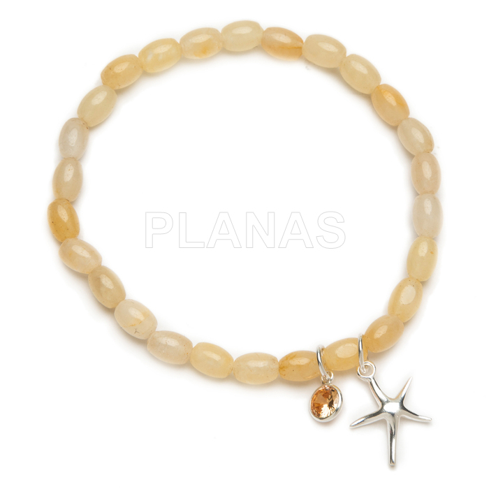 Pulseira elástica em prata de lei e madrepérola. estrela-do-mar e zircônias cúbicas.