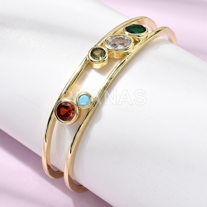 Pulsera rígida en Latón y Baño Oro con circonitas. 