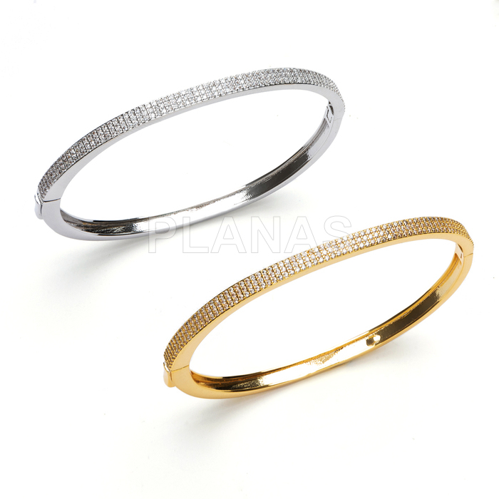Pulsera rígida en latón con circonitas blancas.