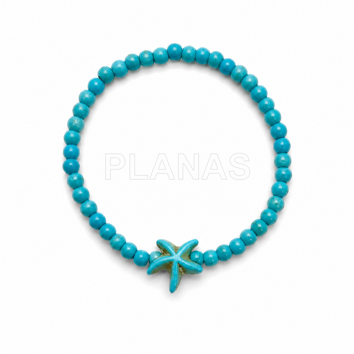 Pulsera elástica turquesa. ESTRELLA DE MAR.