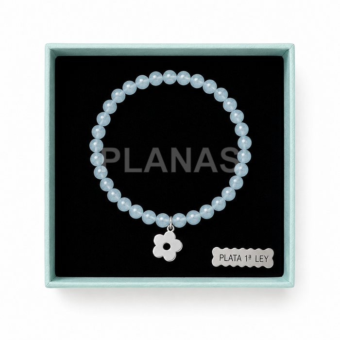 Pulsera para niña elástica en Aguamarina y plata de ley. FLOR. 