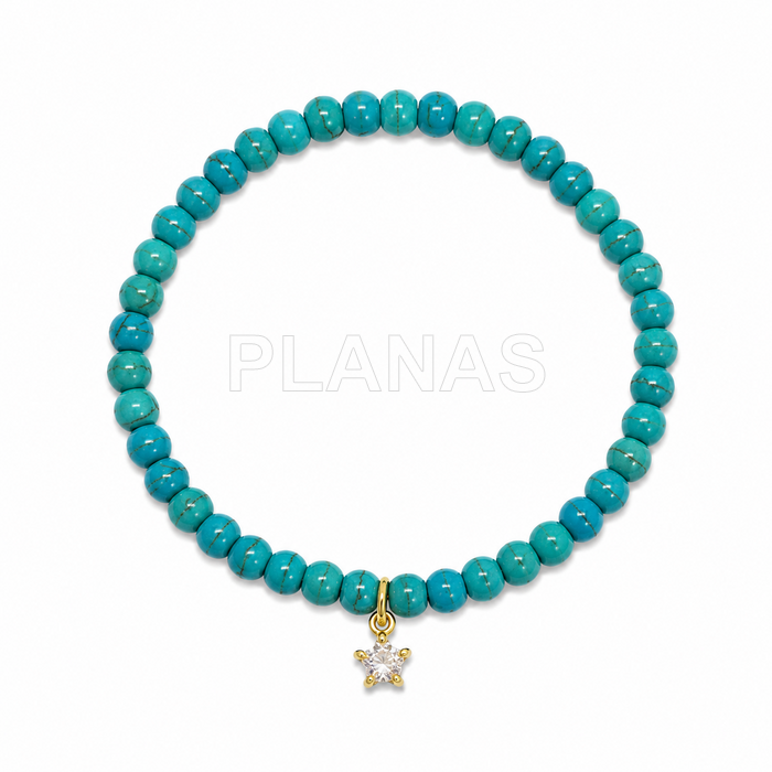 Pulseira elástica em turquesa e prata de lei com zircônias cúbicas brancas em banho de ouro. estrela. 
